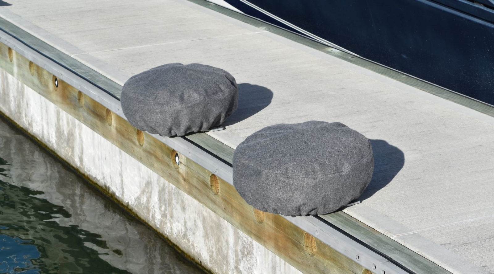 Fleece covered PVC dock wheel covers, the best option for boats with a vinyl wrapped hull. For marina berths, available from Hauraki Fenders