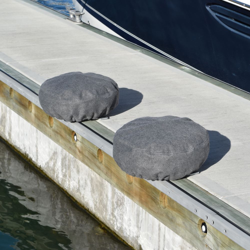 Fleece covered PVC dock wheel covers, the best option for boats with a vinyl wrapped hull. For marina berths, available from Hauraki Fenders